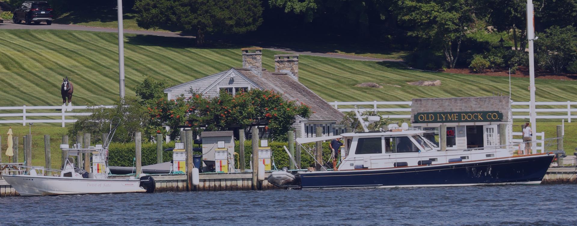 Old Lyme Dock marine fuel with a ship store and small boats